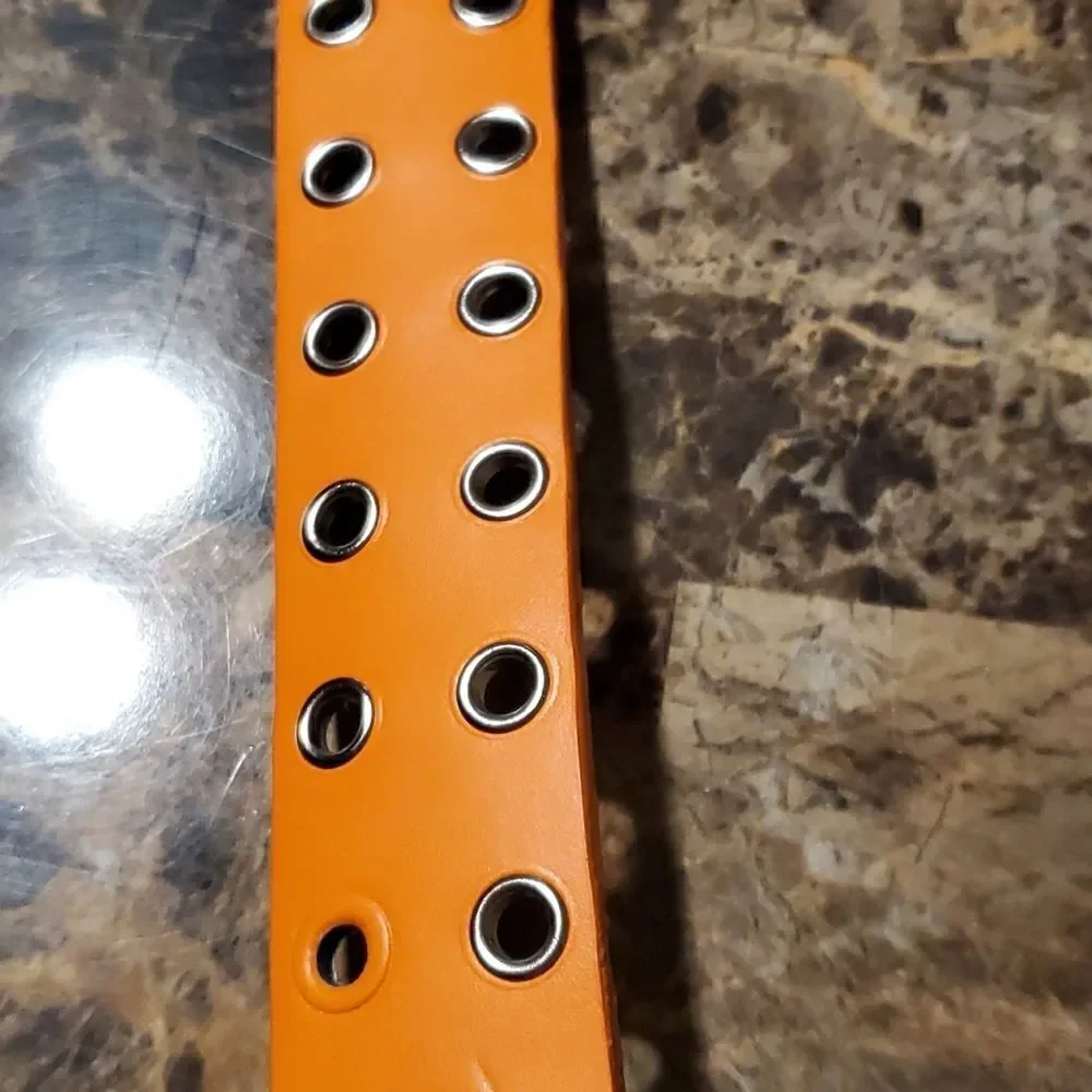 1.5 inch wide orange riveted belt